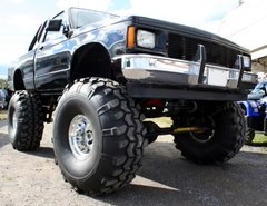 side profile of lifted pickup truck